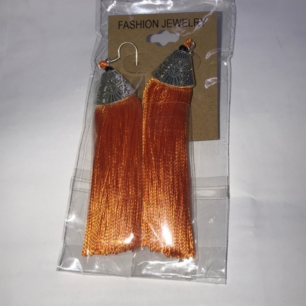 Brand new orange tassel earrings